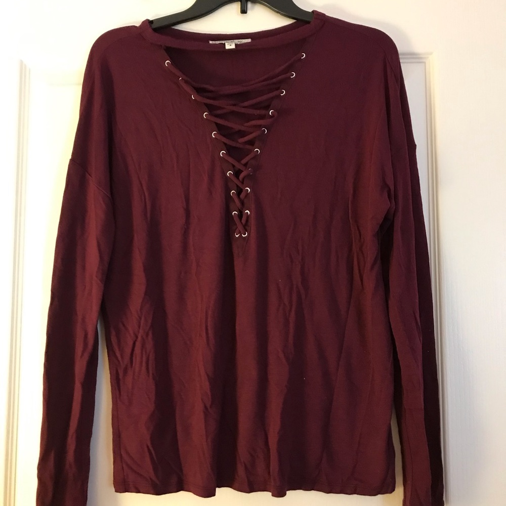 Express. Long sleeve maroon tee. Lace up detail in front. Small